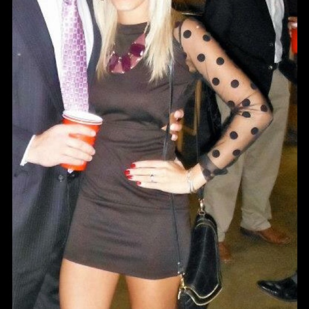 Black dress with sheer polka dot sleeves